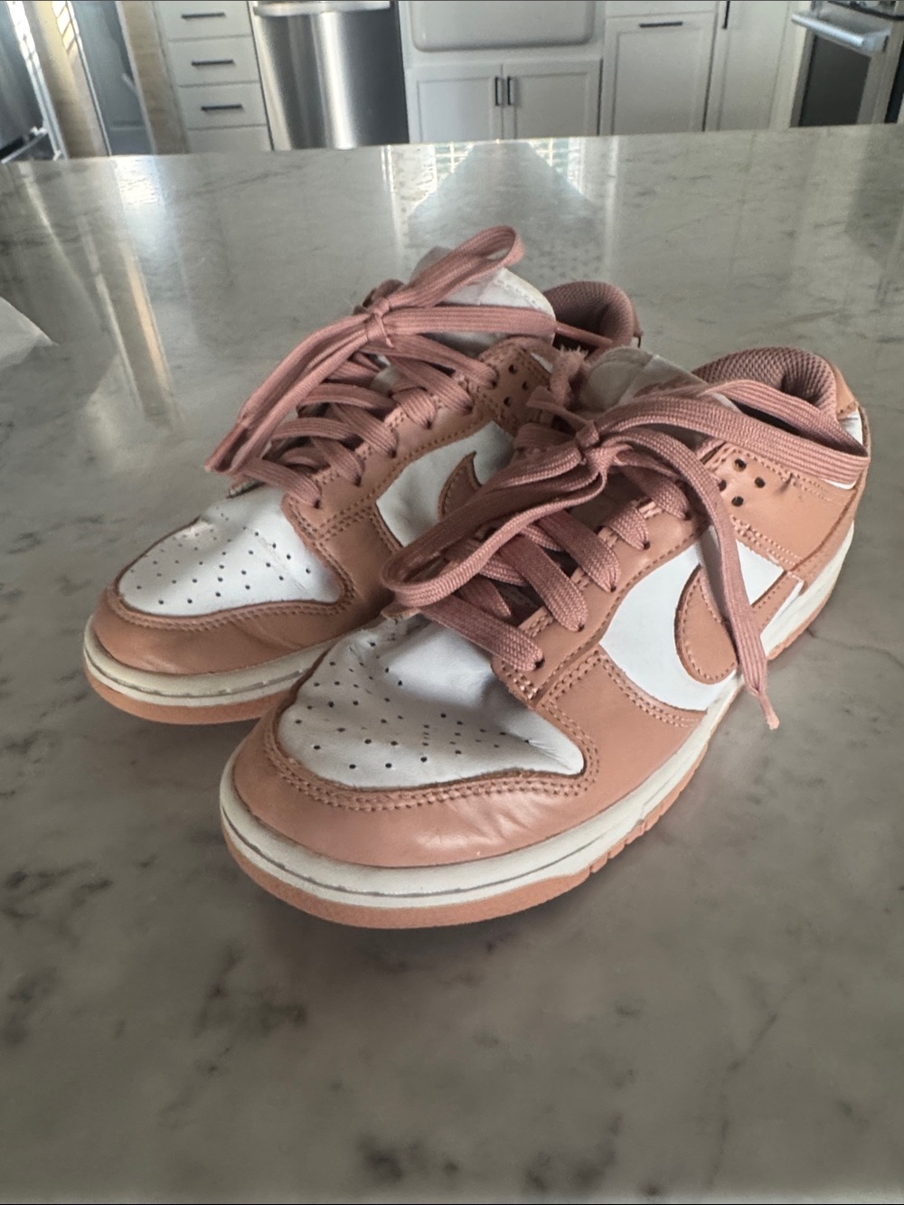 Nike Women’s Jordan Dunks Low-Top Sneakers in Blush Pink and White